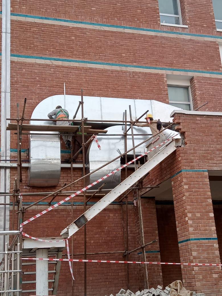 GI duct elbow on rooftop with AHU