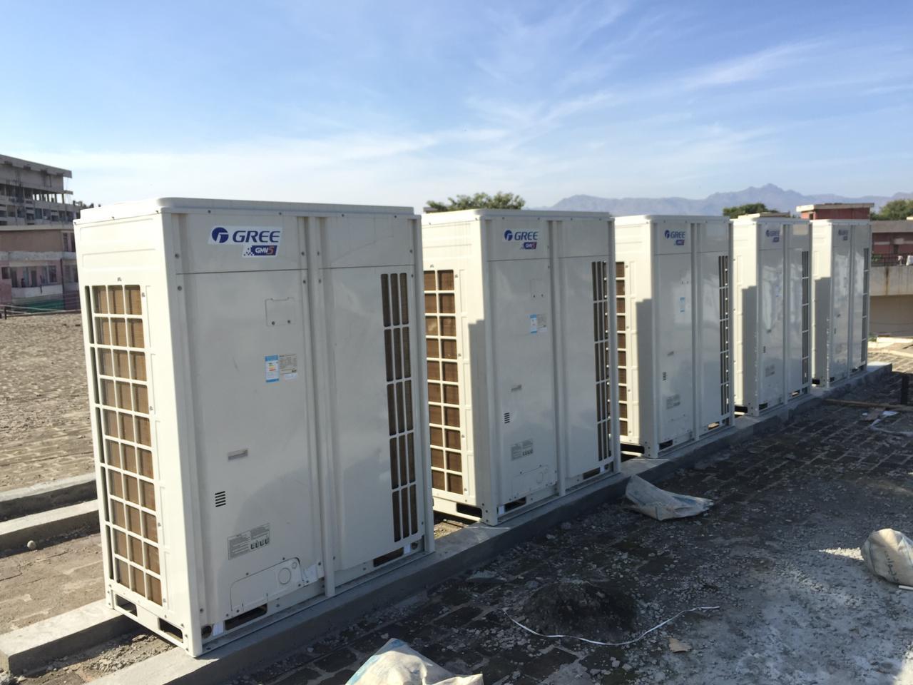 Riser ducts on building facade